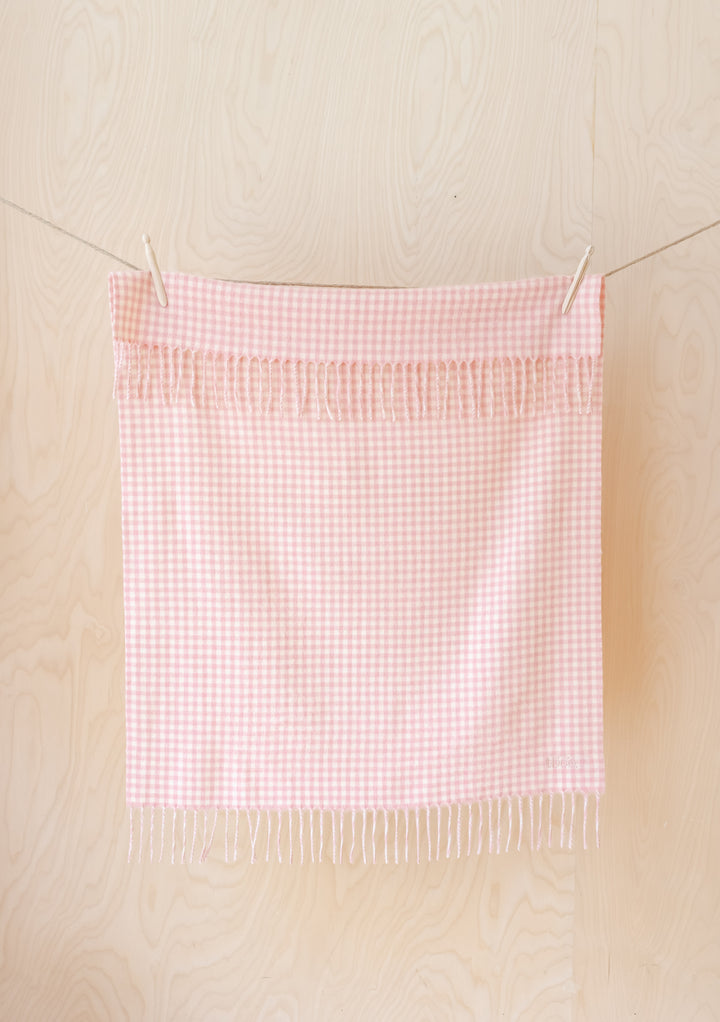 Babydecke aus Lammwolle in Rosa mit Gingham-Muster